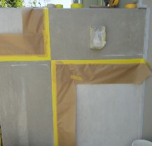 Formwork panels in the wall surface.